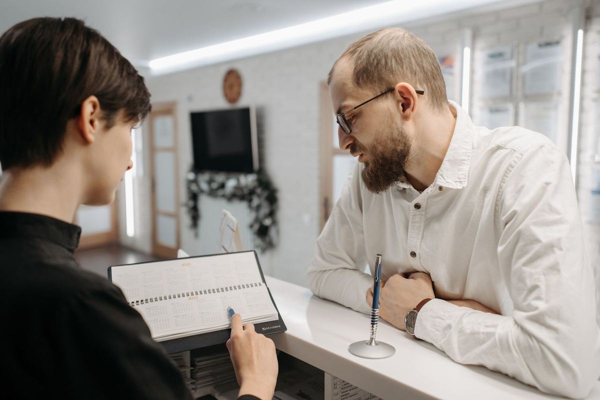 A physician in consultation with a patient